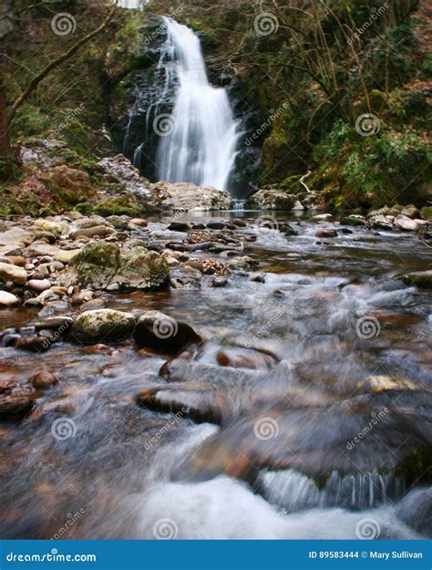 Waterfall With Flowing Water Over Rocks In A Forest Stock Photo Image