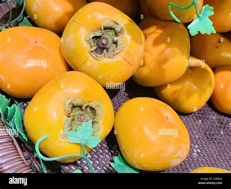 Persimmons Fruits Hi Res Stock Photography And Images Alamy