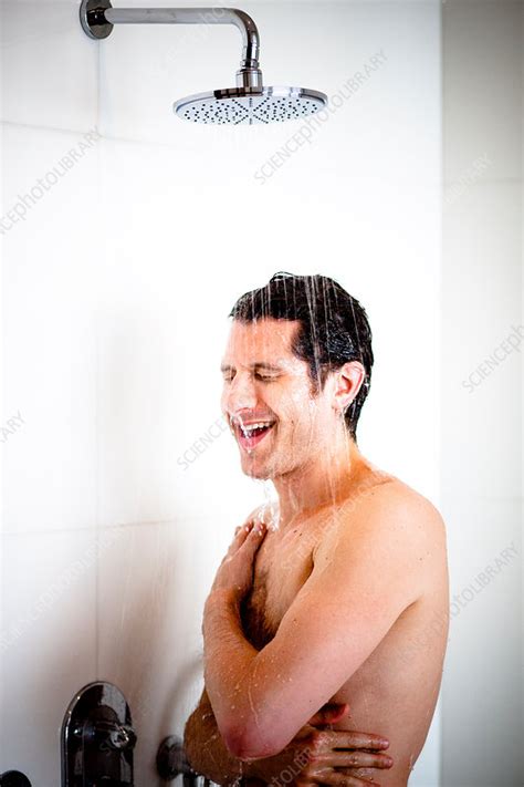 Man Taking Shower Stock Image C031 3705 Science Photo Library