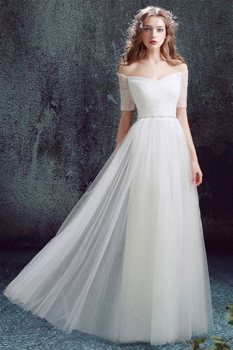 Wading through racks of wedding dresses can make you feel like somewhere along a decade ago (gasp, i can't) when i got married, simple wedding dresses were damn hard to find. Simple Off The Shoulder Tulle Sleeve Wedding Dress Without ...