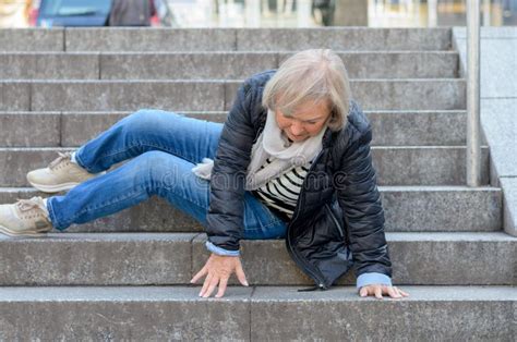 Senior Woman Falling Down Stone Steps Outdoors Stock Image Image Of