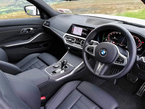 The Interior Of The Bmw 3 Series Changing Lanes
