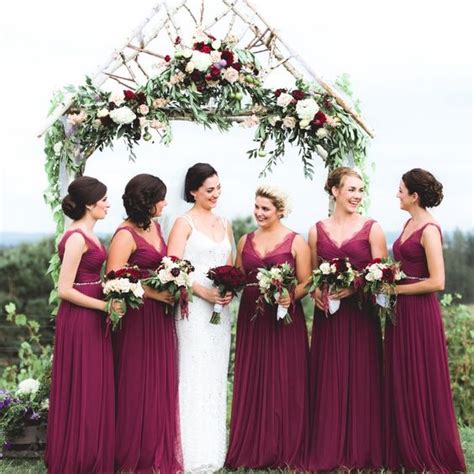 The Bridesmaids Wine Colored Bhldn Dresses Served As The Jumping Off