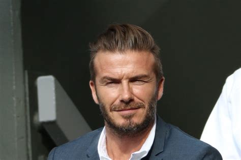 David Beckham Catches Tennis Ball During Wimbledon Match