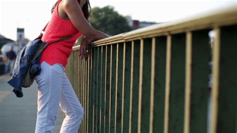 Woman Leaning On Railing Stock Video Footage 0018 Sbv 302493342