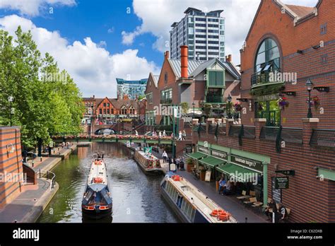 Narrowboats in front of restaurants on the canal at Brindley Place