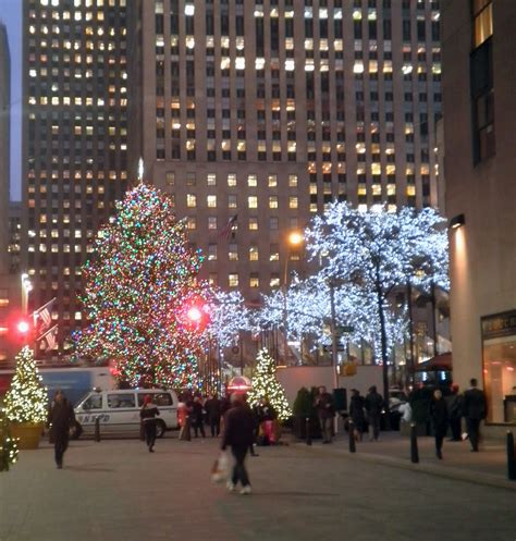 Pocket Blonde Rockefeller Center At Night