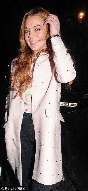 Lindsay Lohan Chic In Coat And Skinny Jeans At Nozomi With Friends