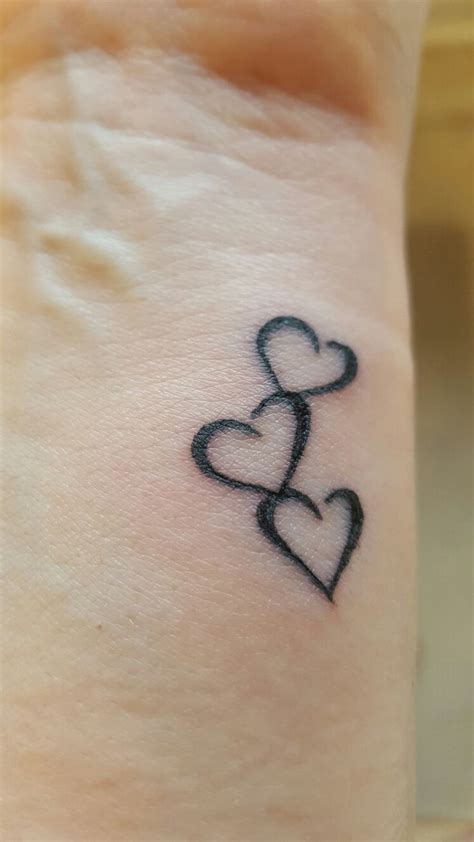 Three Hearts To Symbolise Me My Husband And Son Tattoos For