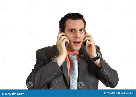 Man Shocked With Two Telephones Stock Photo Image Of Call