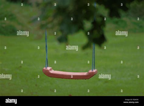 Empty Swing In Park Stock Photo Alamy