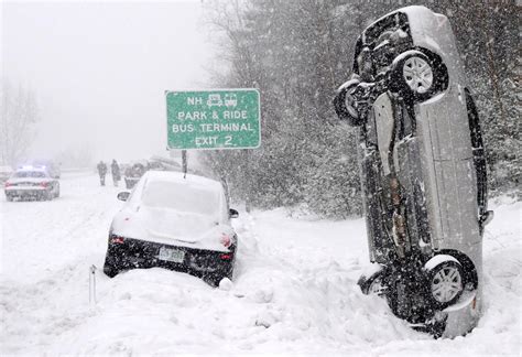 Car Landed Vertically Into A Snowbank After A Multiple Vehicle Accident