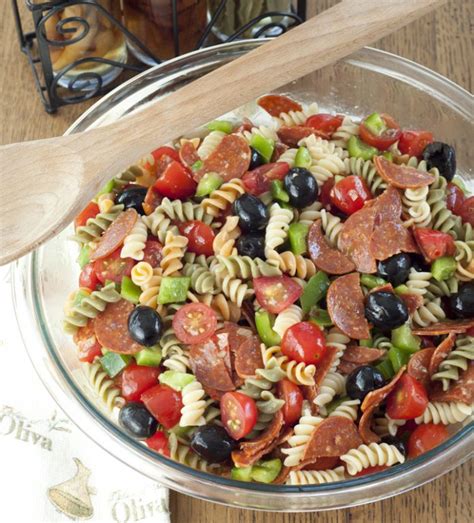 They're easy yet delicious and come together quickly, plus they don't require much heat. Classic Italian Pasta Salad | Wishes and Dishes