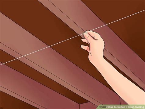 The roll of installing a suspended ceiling is to cover a lot of flaws and obstructions, as pipes, wiring and duct work. How to Install a Drop Ceiling: 14 Steps (with Pictures ...