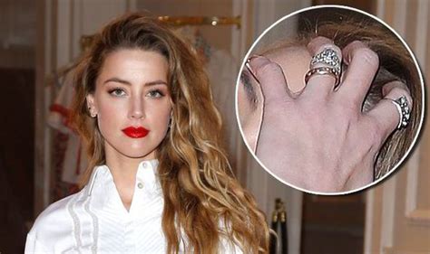 Amber Heard Shows Off Her Dazzling Ring At First Appearance Since