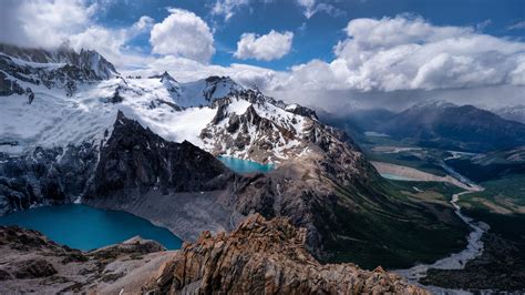 Montañas De La Argentina Cubiertas De Nieve Bajo Nublado Blue Sky 4k