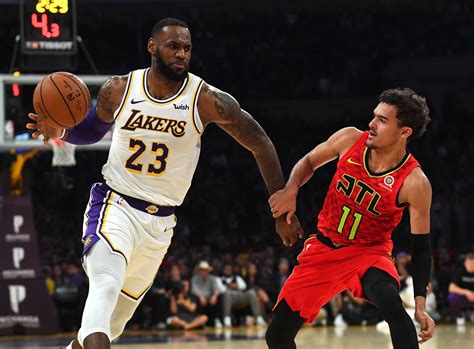 Point guard for the atlanta hawks throughthelens.com. LeBron James and Trae Young set the NBA alight | The ...