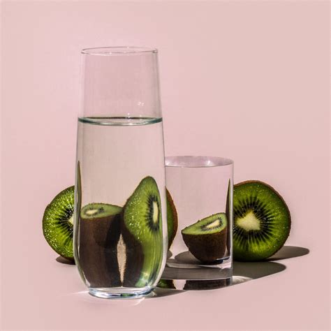 Distorted Fruit And Vegetables Through Water Filled Glasses Glass