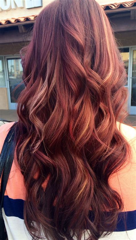 Brown hair is usually highlighted to make it look not boring, to give it texture and volume. Red with blond peekaboo highlights. | Mahogany hair, Hair ...