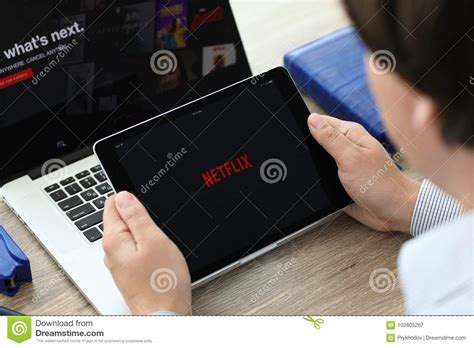 Man Holding Ipad Pro With Netflix Provides Streaming Media Editorial