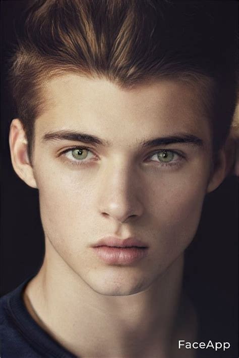 A Young Man With Brown Hair And Green Eyes