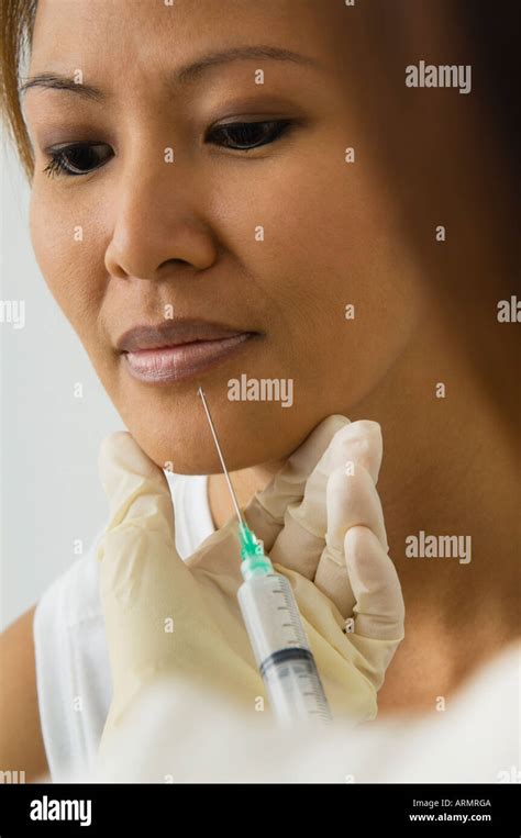 Asian Woman Receiving Botox Injection Stock Photo Alamy