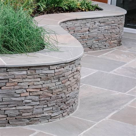 How To Install Stacked Stone Garden Wall 101 Resources Stacked