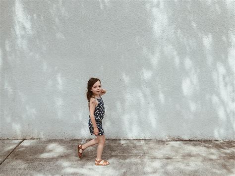 Girl Walking And Smirking By Stocksy Contributor Sidney Scheinberg