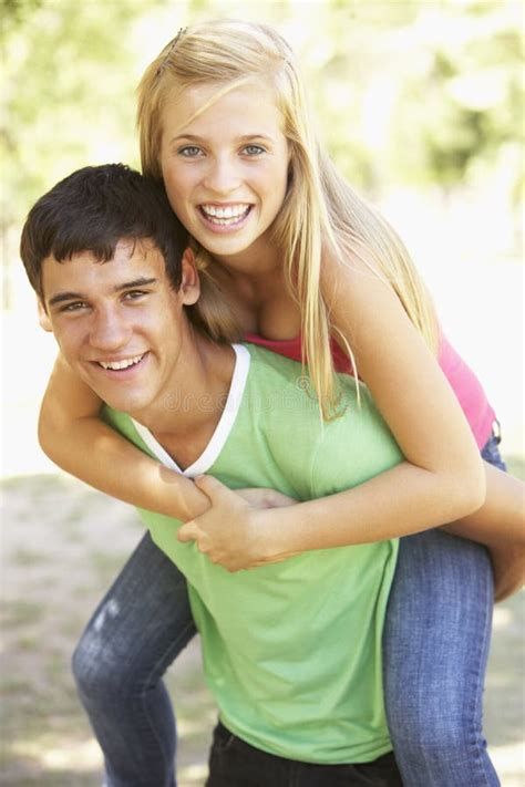 Teenage Couple Having Fun In Park Together Stock Image Image Of Vertical Camera 55890255