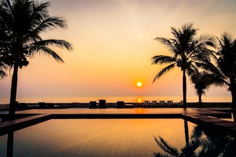Premium Photo Silhouette Coconut Palm Tree Around Outdoor Swimming Pool
