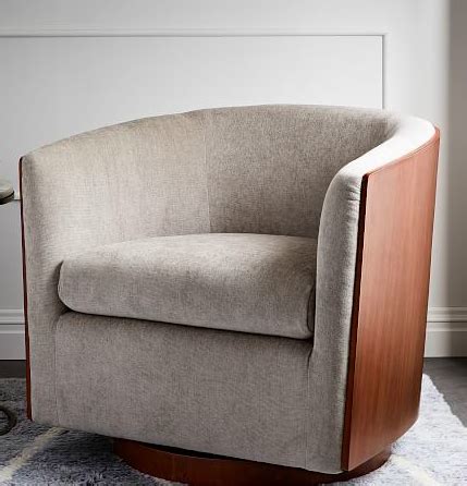 A slightly modern take on the barrel (or tub) chair, we liked what we saw in pictures and were initially excited to take a spin in it (literally). West Elm Luther barrel swivel chair | Chair