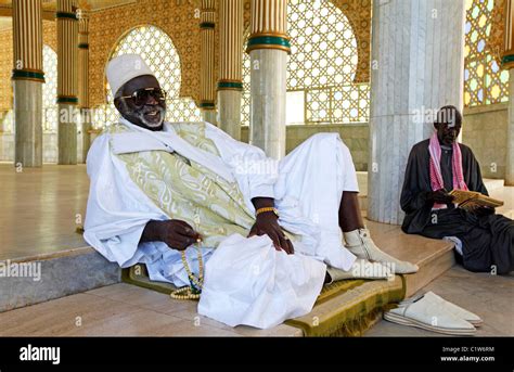 A Marabout Islamic Spiritual Leader On The Steps Of The Great Mosque