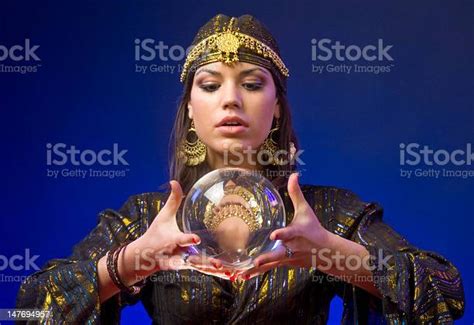 A Fortune Teller With A Crystal Ball Stock Photo Download Image Now