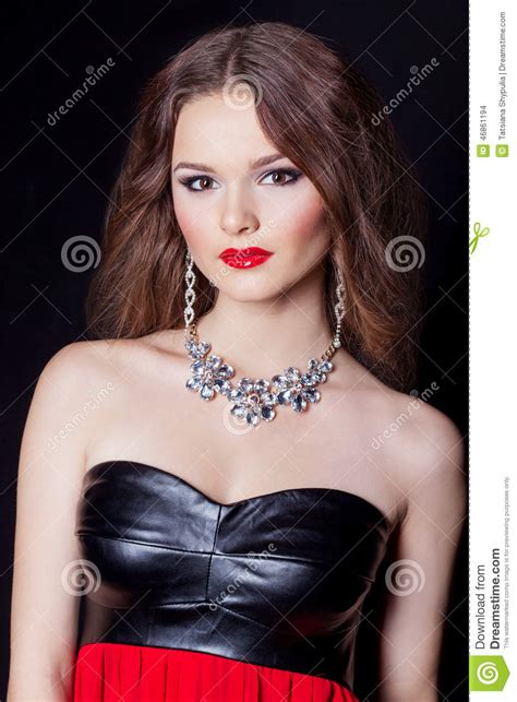 Portrait Of A Beautiful Elegant Girl In Evening Dress With A Large