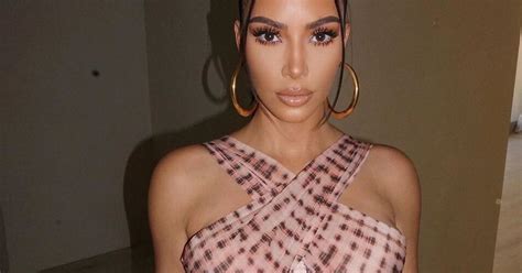 Kim Kardashian Squeezes Into Boob Hugging Top In Jaw Dropping Snaps