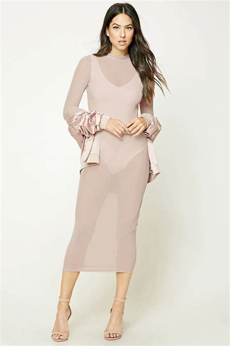 A Sheer Mesh Maxi Dress Featuring A Mock Neck Long Sleeves A Bodycon