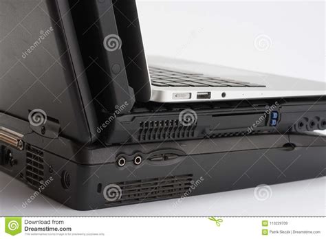 Comparing Of Laptops New Modern And Two Old Laptops Stock Image