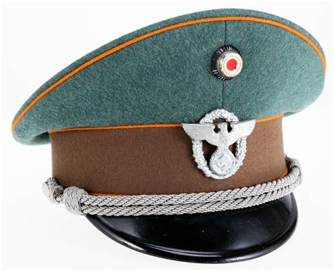 wwii german officer s visor cap of a schutzpolizei der gemeinden gendarmerie or state rural