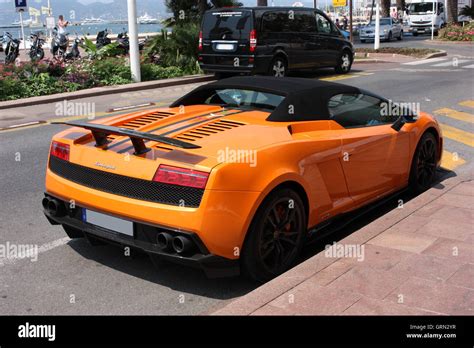 Orange Supercar Lamborghini Gallardo Spyder At The City Street Stock
