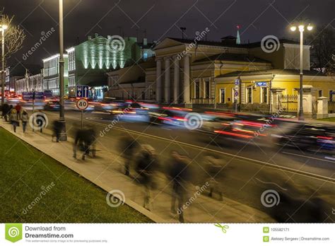 Night Traffic And The Crowd Of People On Urban Street Stock Image