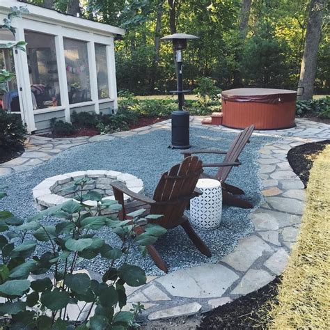 Crushed Blue Granite Patio With A Flagstone Border And Stone Firepit
