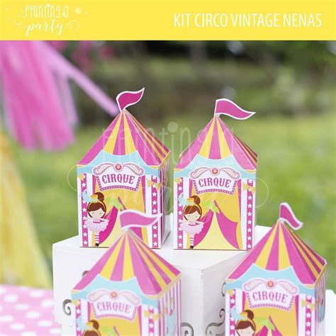 Three Circus Tents Sitting On Top Of A Table Next To A Pink And Yellow Tent