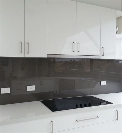 Metallic Charcoal Colours Look Stunning Against White Kitchens