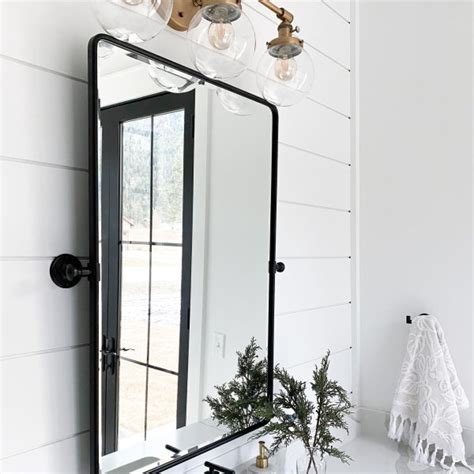 The mean a washbasin cabinet, with one or more sinks, and furniture under a container sink. Vintage Rounded Rectangle Pivot Mirror | Black bathroom ...