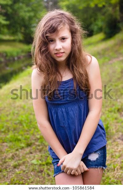 Cute Teenage Girl Looking Shy Natural Stock Photo Edit Now
