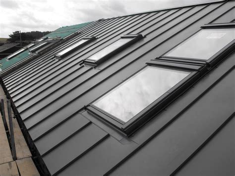 Metal roof with Velux window. | Metal roof panels, Aluminum roof panels, Solar panels roof
