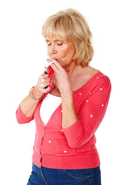 Old Lady Smoking Cigarette Stock Photos Pictures And Royalty Free Images