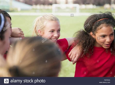 Teenage Girls In Soccer Team Huddle Stock Photo Alamy