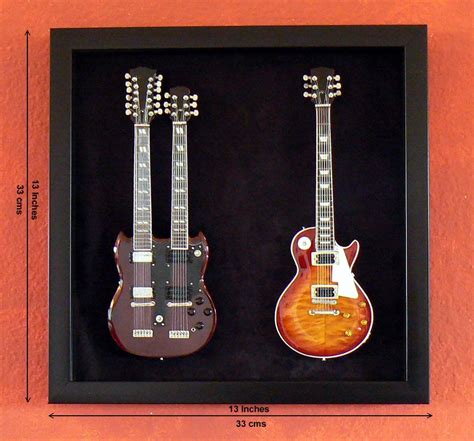 This beautifully crafted shadow box houses two of Jimmy Page's most