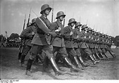 Reichswehr troops parade in 1930. Limited to 100,000 men, the ...